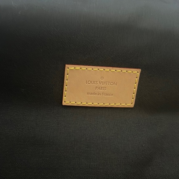 Luis Vuitton cream/brown carry/duffel bag. - Picture 2 of 9